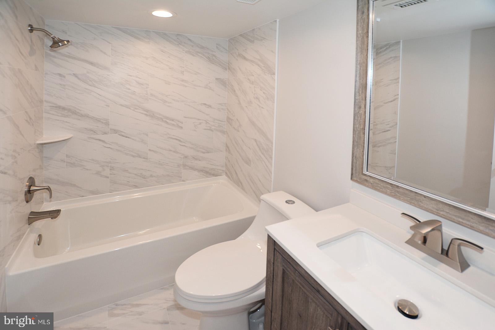 5900 Cove Landing Road, Unit 204 Burke, VA 22015 - Photo 17 of 25 Updated Shared Bathroom