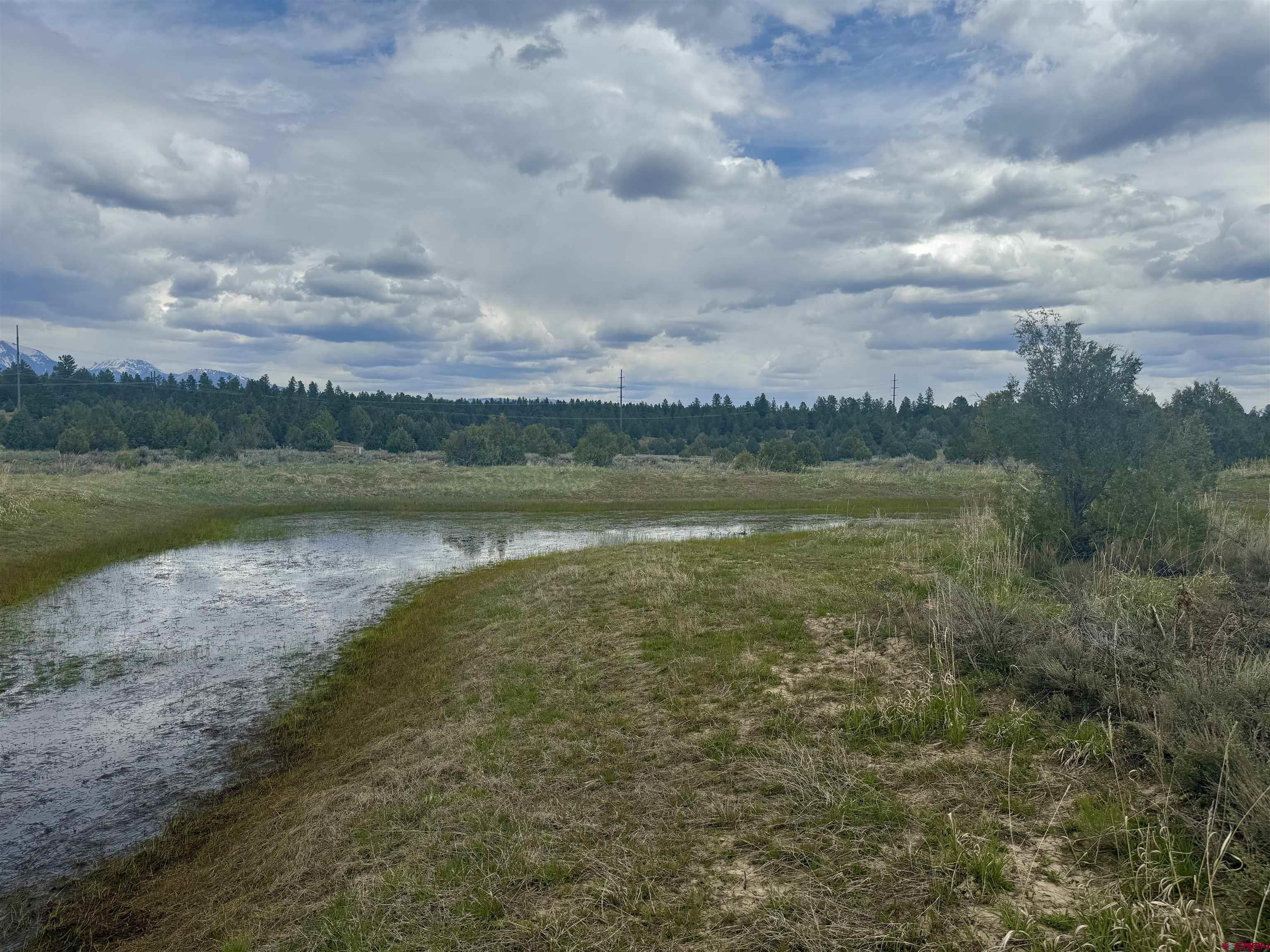 1781 Heritage Road Hesperus, CO 81326 - Photo 26 of 30 a view of a lake with houses in the back