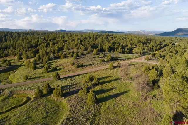 a view of a lake with a mountain in the background