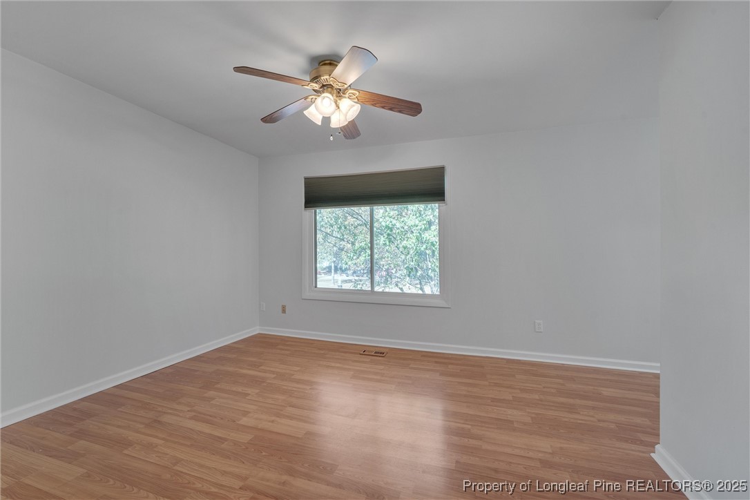 1304 Seaton Road, Unit 17 Durham, NC 27713 - Photo 22 of 32 a view of an empty room with a window