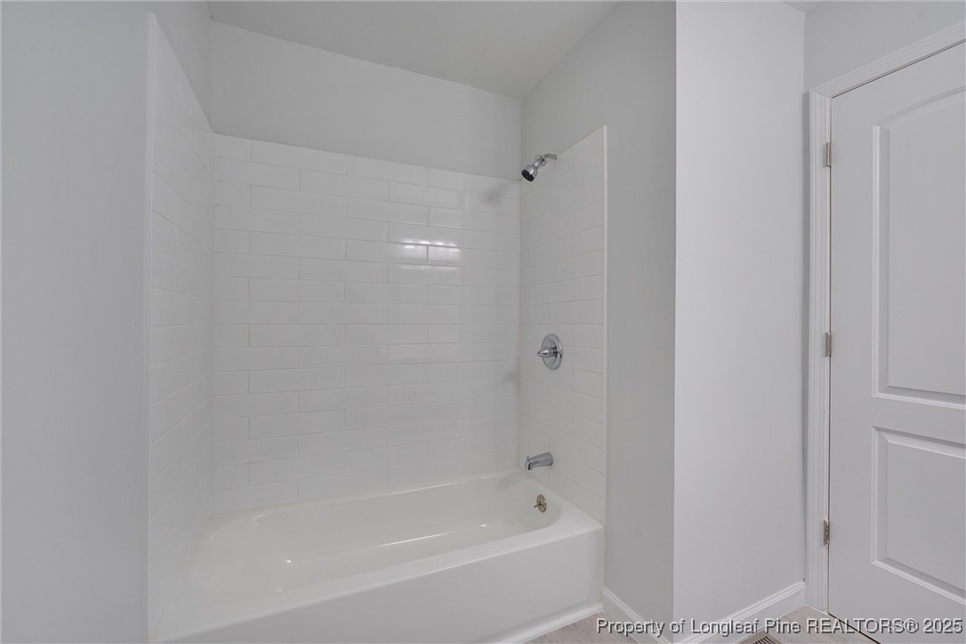 1304 Seaton Road, Unit 17 Durham, NC 27713 - Photo 28 of 32 a bathroom with a bathtub