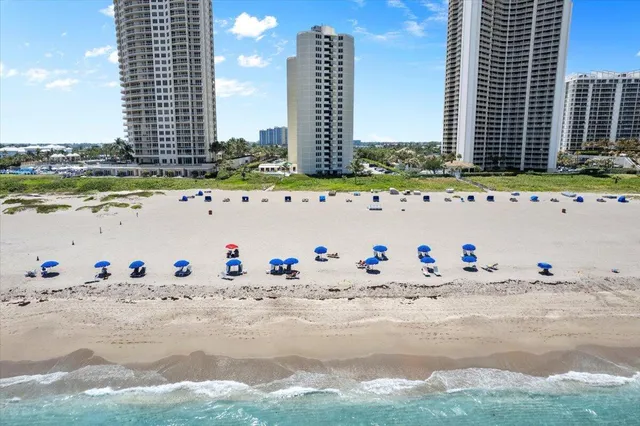 a view of a city with an ocean view