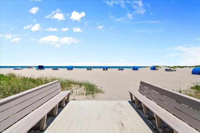 a view of swimming pool with outdoor space and seating area
