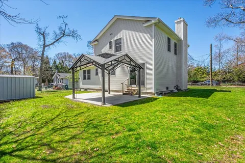 a house view with a outdoor space