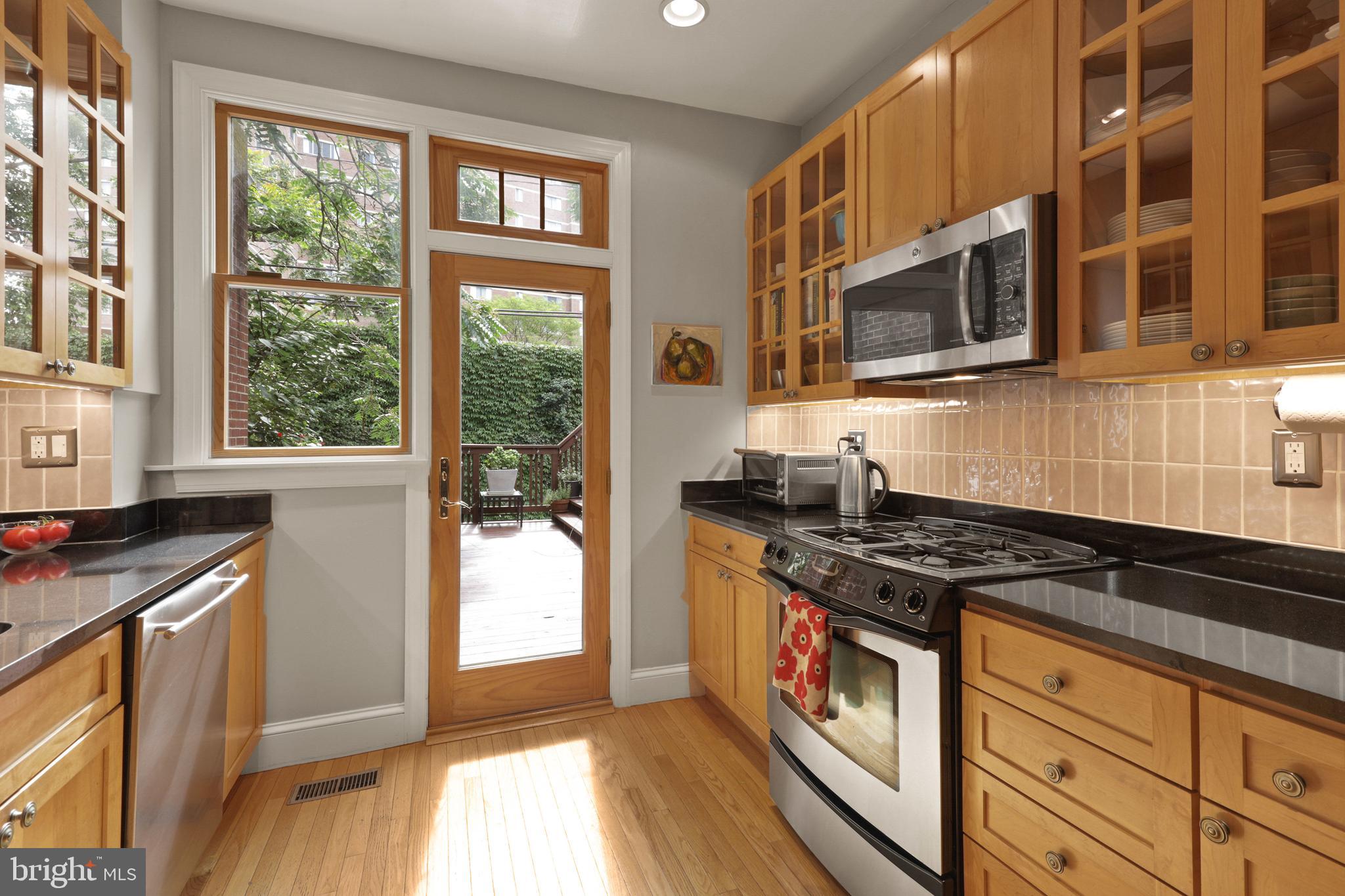 3909 Cloverhill Road Baltimore, MD 21218 - Photo 14 of 62 Glass Front Cabinets