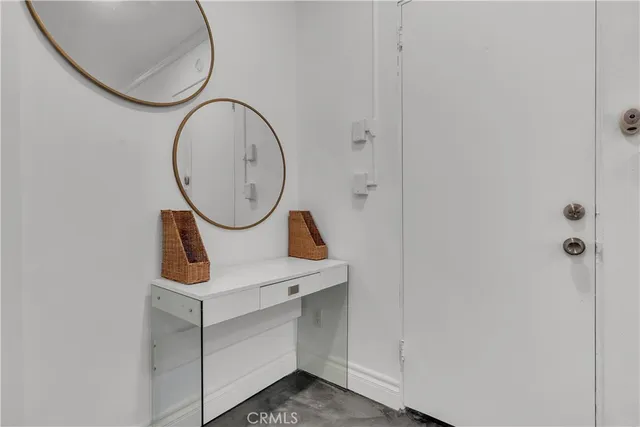 a bathroom with a sink a mirror and a shower