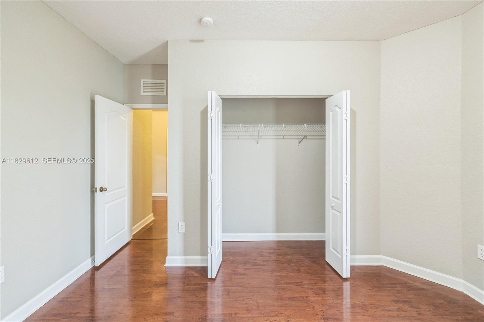 11266 Southwest 236 Lane Homestead, FL 33032 - Photo 16 of 32 a view of hallway with wooden floor