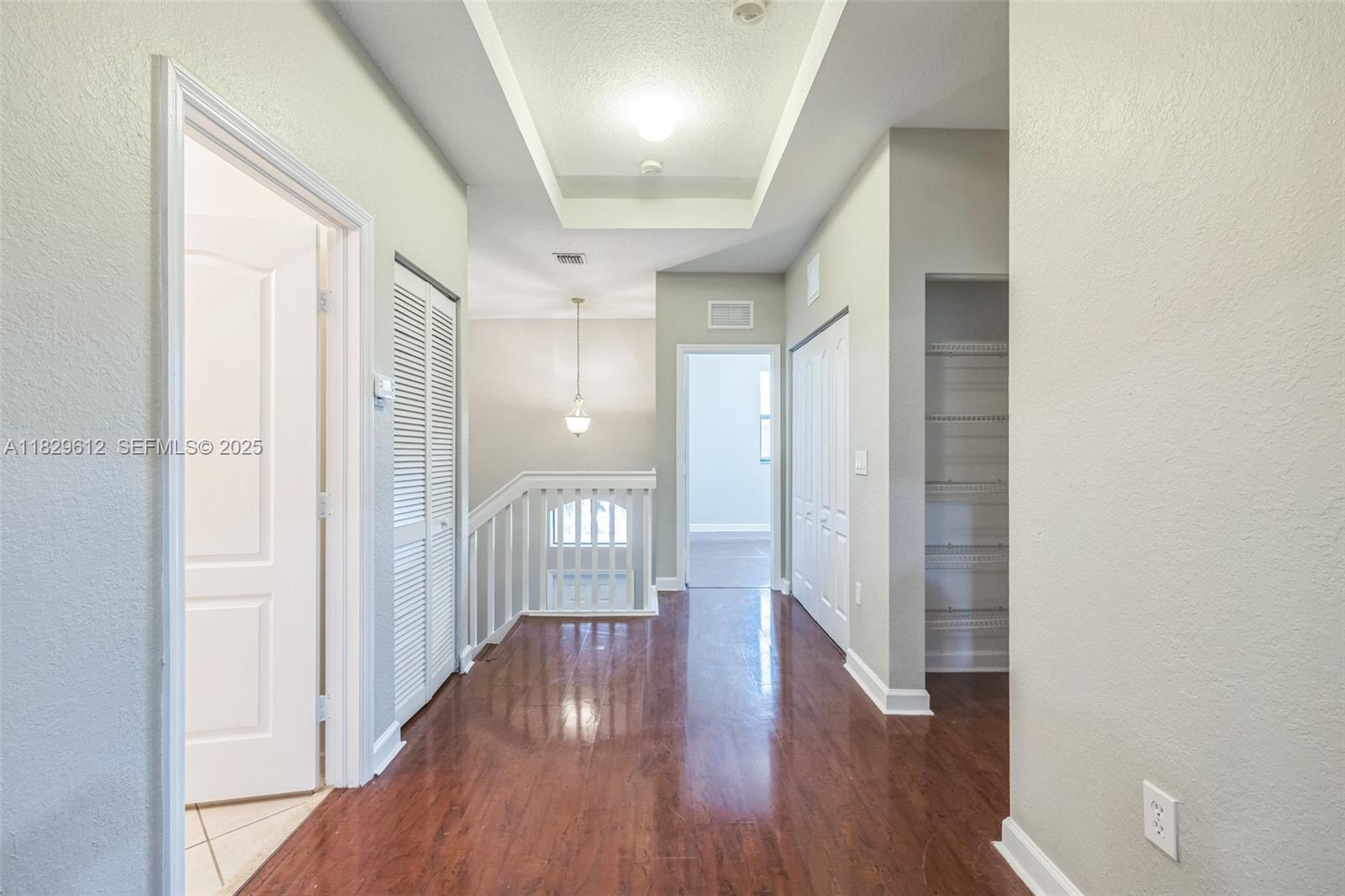 11266 Southwest 236 Lane Homestead, FL 33032 - Photo 20 of 32 a view of entryway with wooden floor