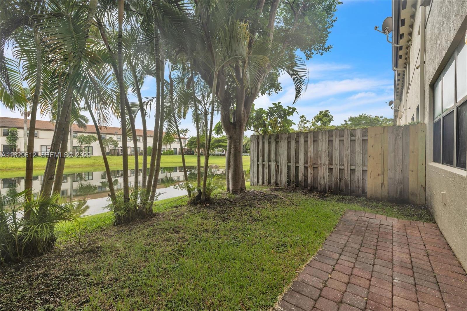 11266 Southwest 236 Lane Homestead, FL 33032 - Photo 4 of 32 a view of a yard with palm trees