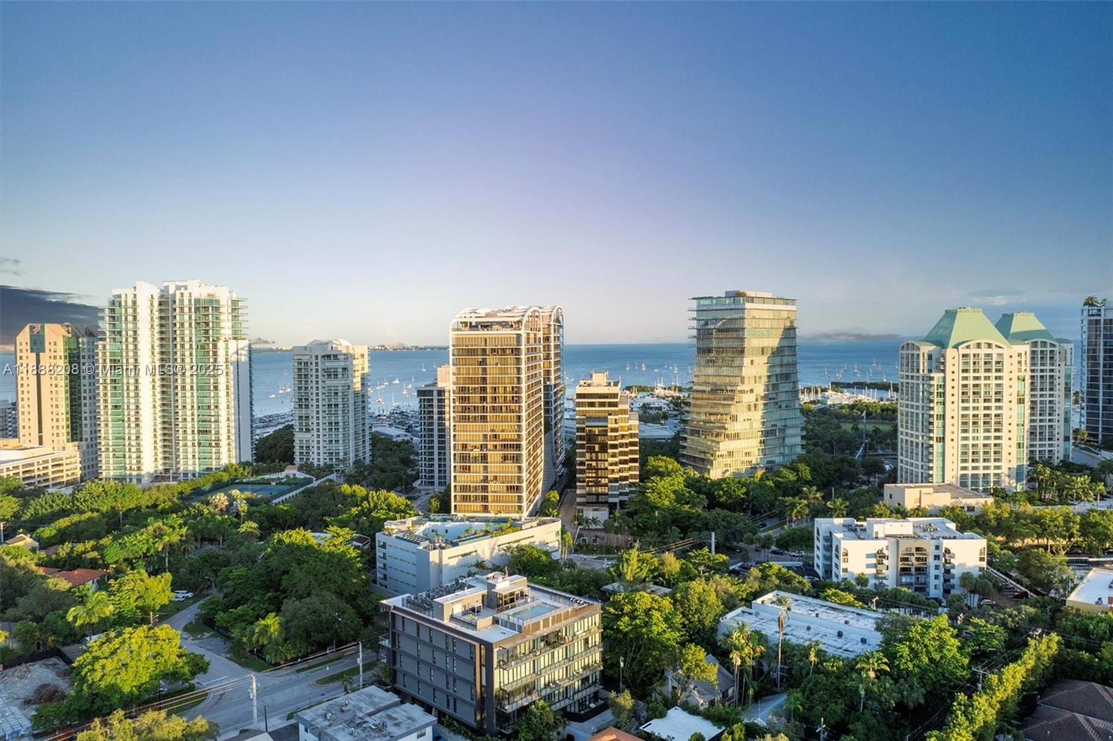3156 Southwest 27th Avenue, Unit 203 Miami, FL 33133 - Photo 30 of 34 a city view with tall buildings