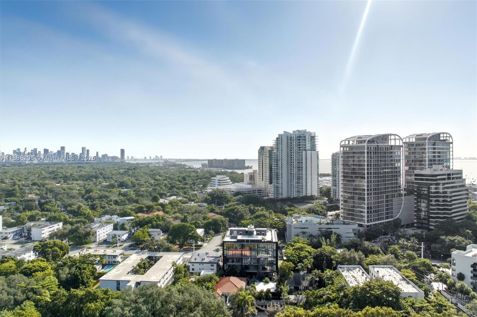 3156 Southwest 27th Avenue, Unit 203 Miami, FL 33133 - Photo 33 of 34 a view of a city with tall buildings