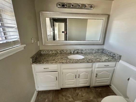1319 Parker Road St. Paul, TX 75098 - Photo 15 of 19 a bathroom with a granite countertop sink and a mirror
