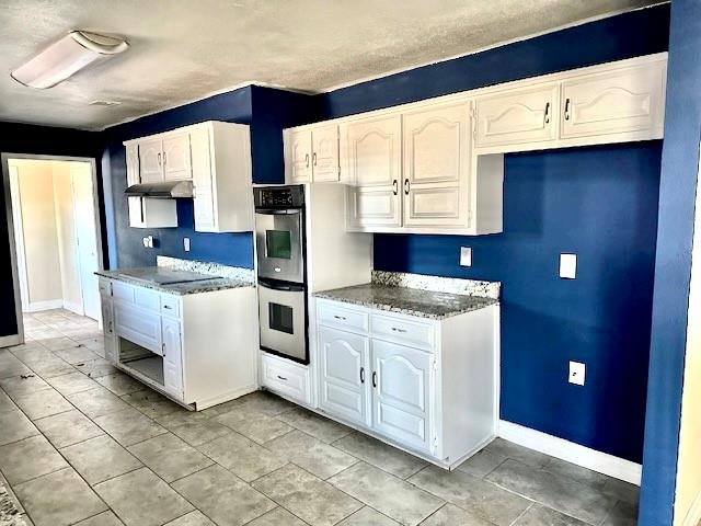 1319 Parker Road St. Paul, TX 75098 - Photo 7 of 19 a kitchen with stainless steel appliances granite countertop a stove a sink and a microwave