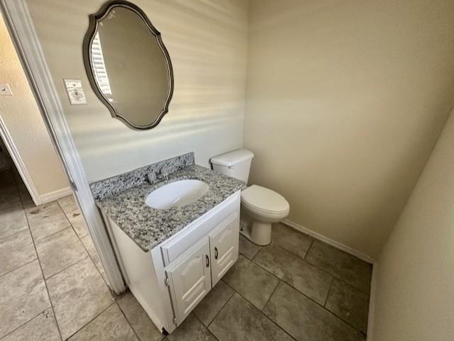 1319 Parker Road St. Paul, TX 75098 - Photo 9 of 19 a bathroom with a granite countertop sink and a mirror