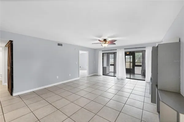 a view of an empty room and window