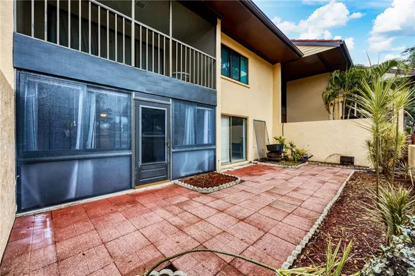 a view of a yard with swimming pool