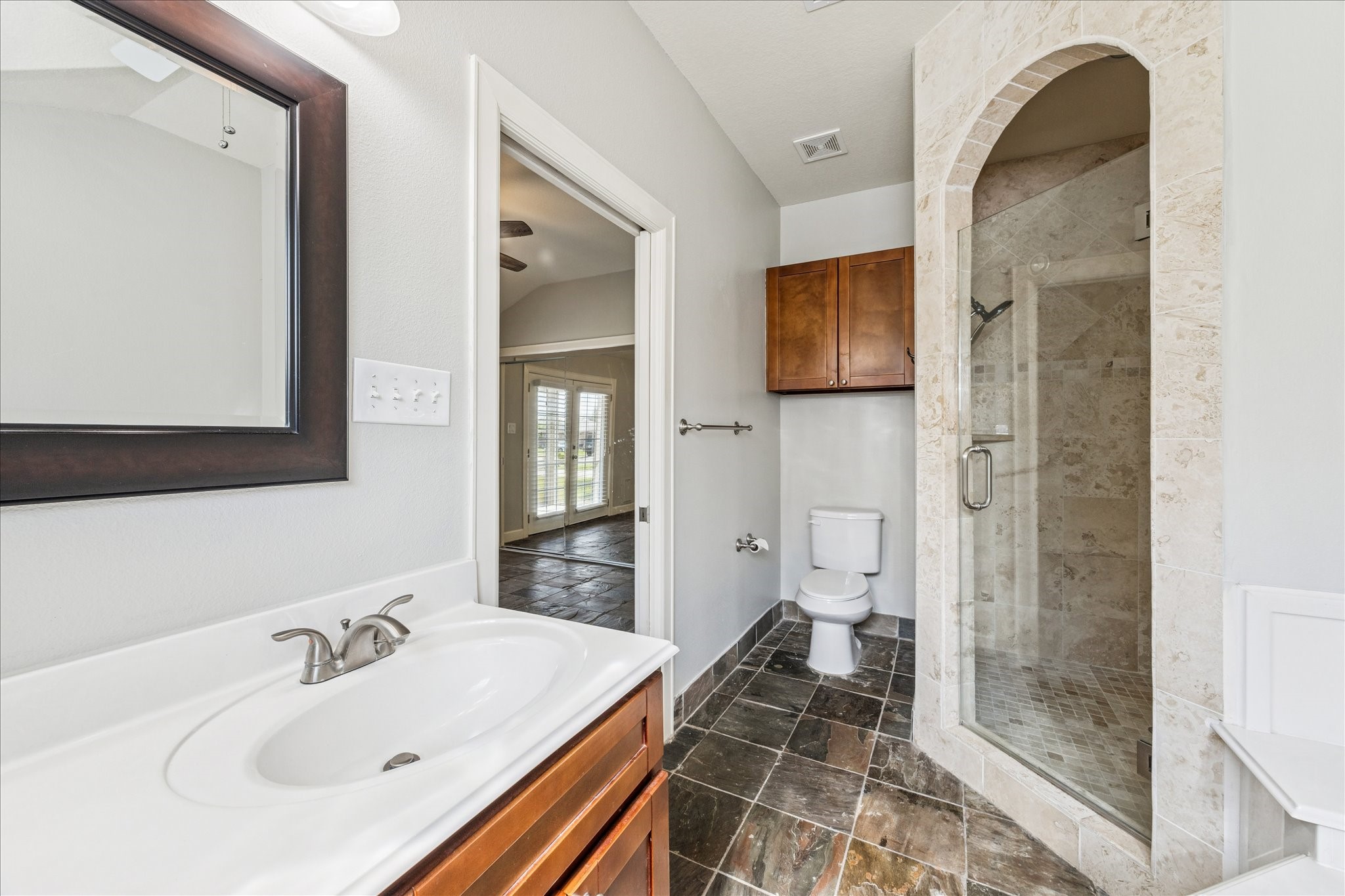 282 Debbie Lane San Leon, TX 77539 - Photo 16 of 29 a bathroom with a sink and a mirror