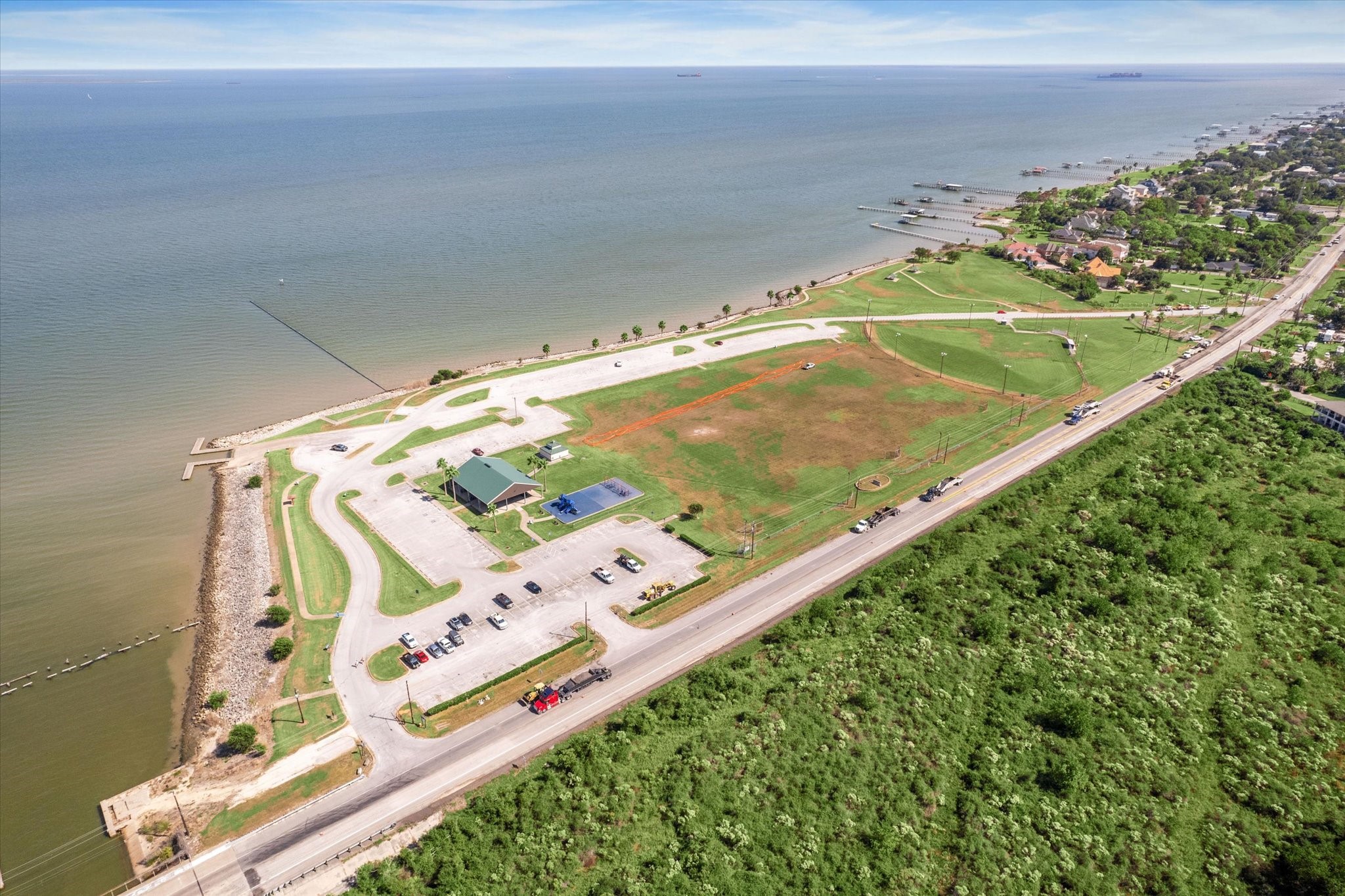282 Debbie Lane San Leon, TX 77539 - Photo 26 of 29 view of a pool with an ocean view