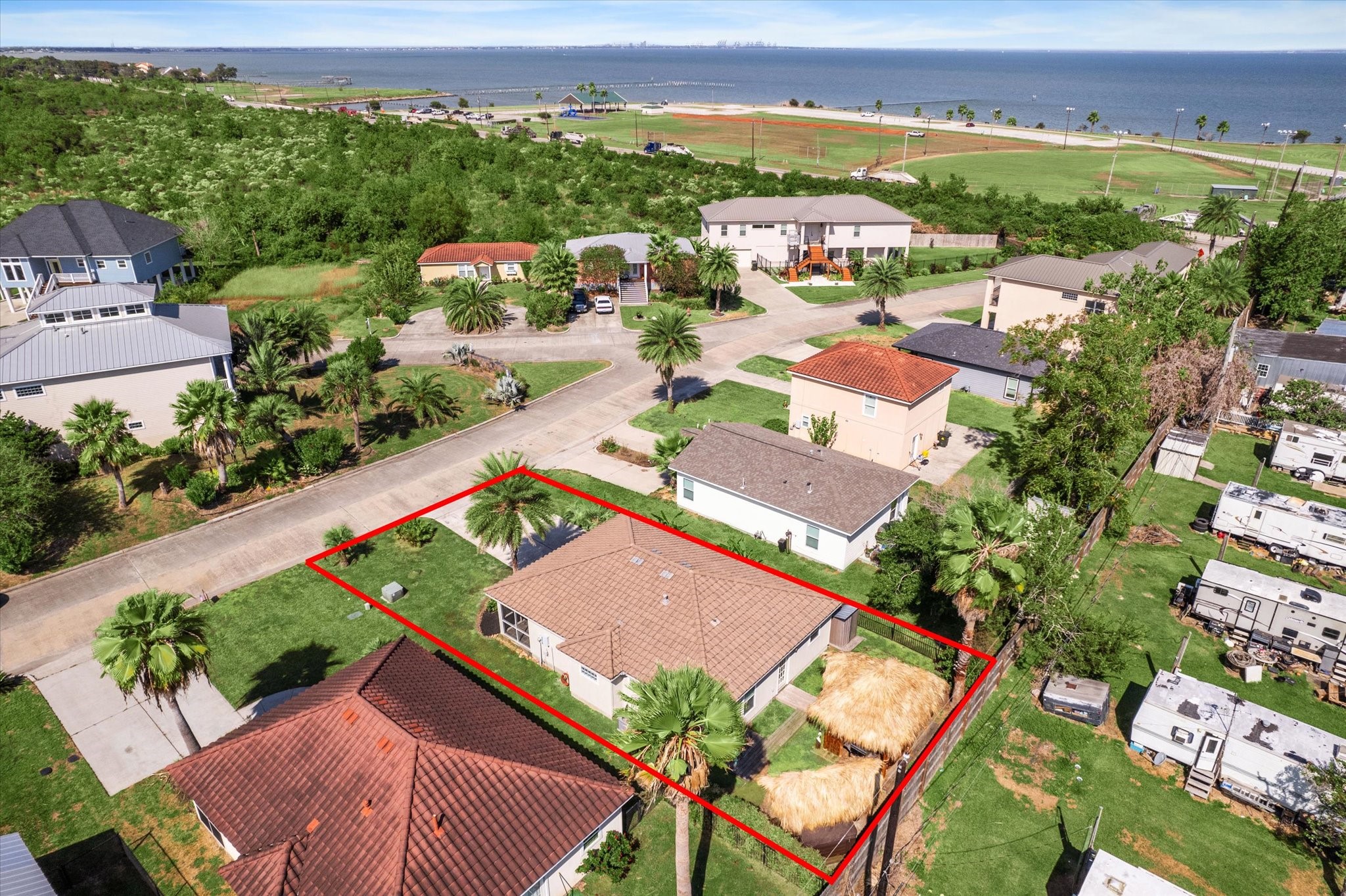 282 Debbie Lane San Leon, TX 77539 - Photo 3 of 29 an aerial view of a house with a garden