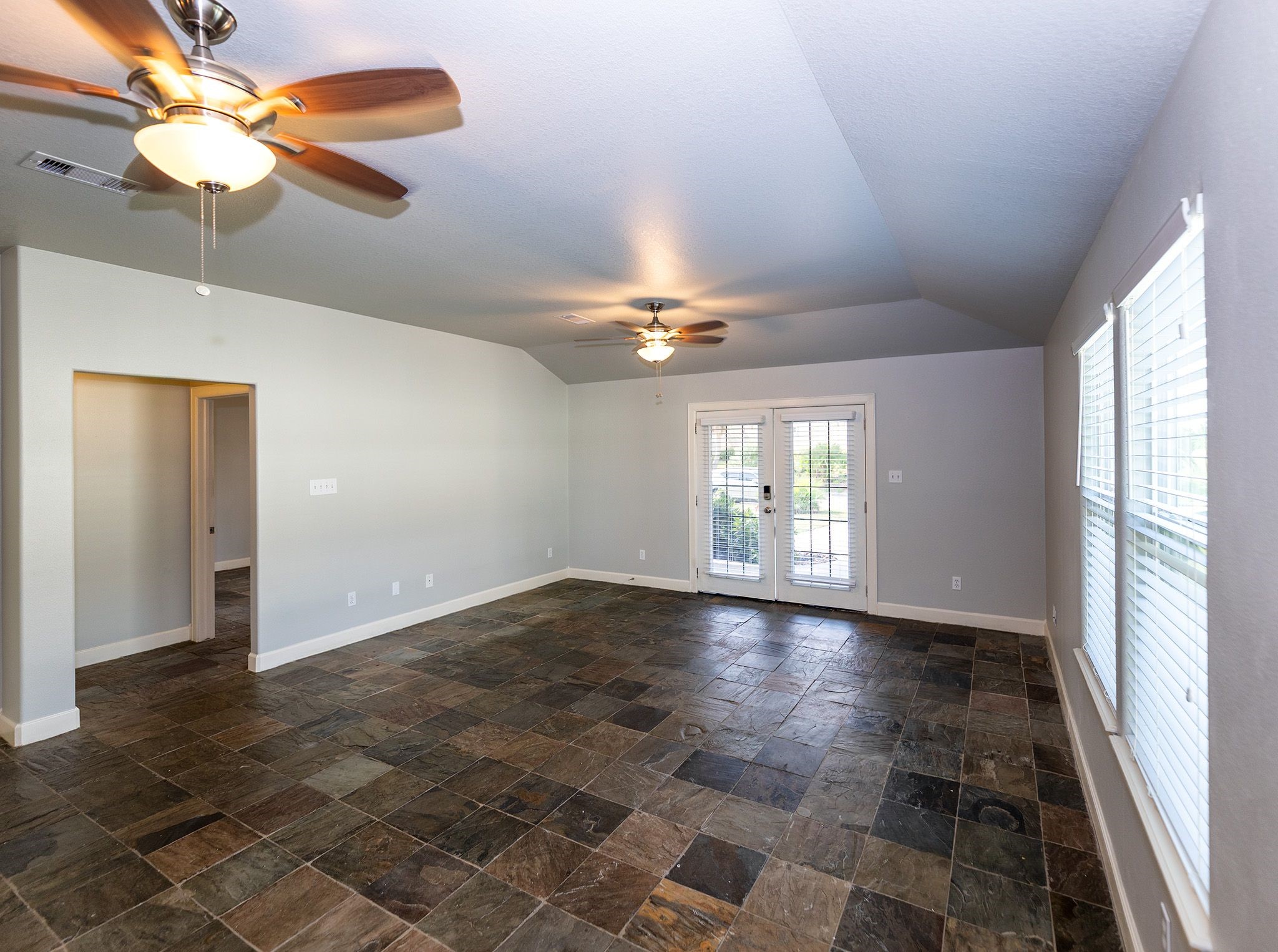 282 Debbie Lane San Leon, TX 77539 - Photo 6 of 29 a view of empty room with wooden floor and fan