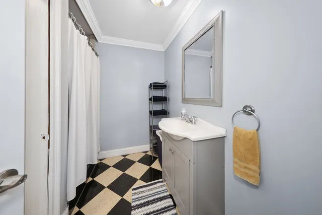 a utility room with a sink dryer and washer