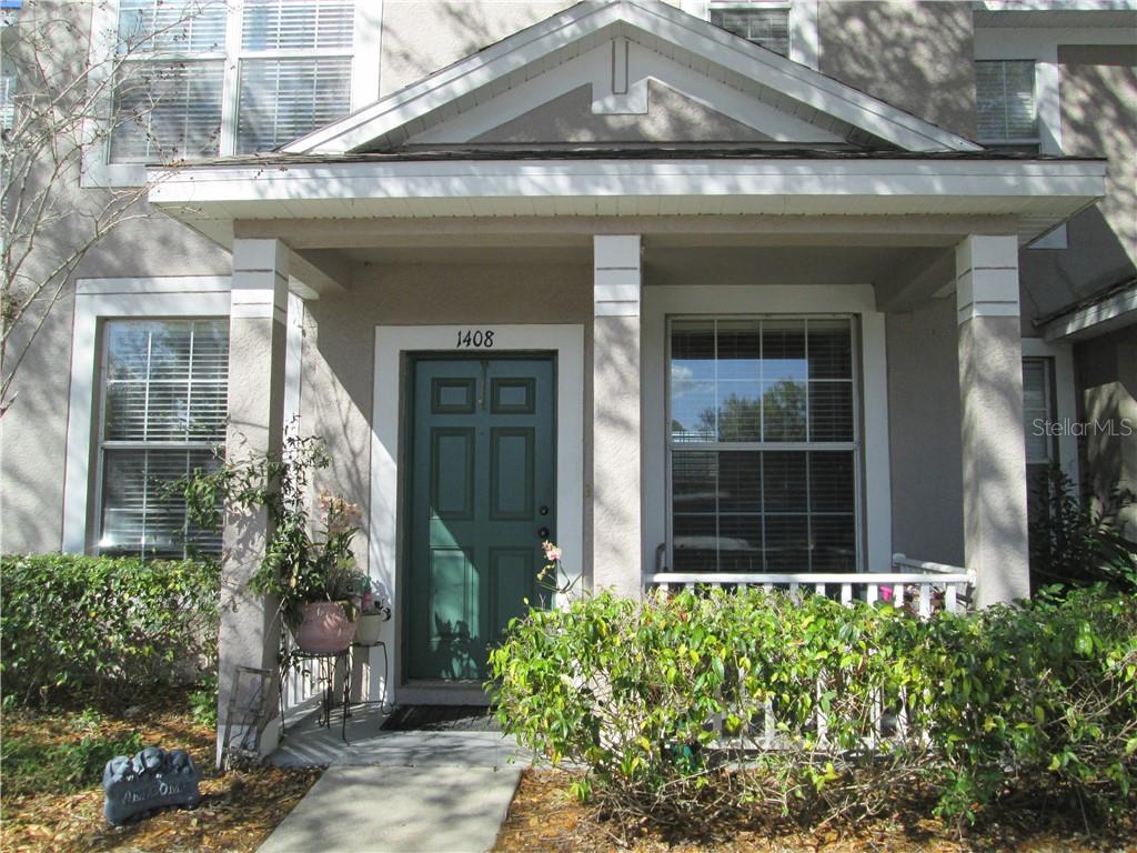 1408 Blue Magnolia Road Brandon, FL 33510 - Photo 1 of 1 front view of a house