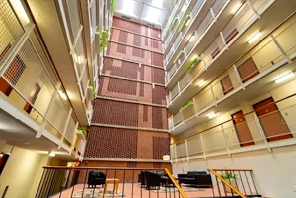 a view of a building with a street
