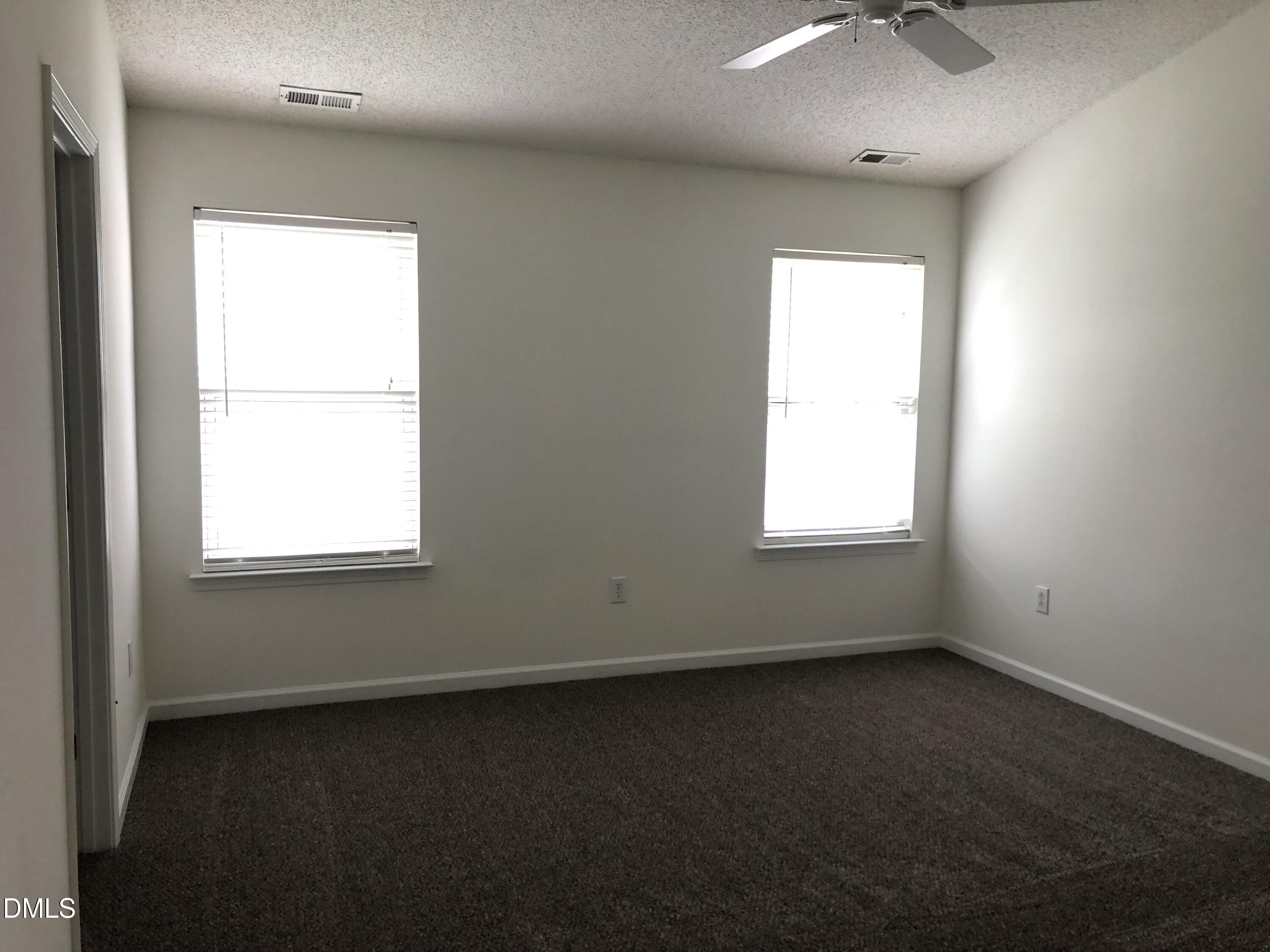 4806 Tapestry Terrace Durham, NC 27713 - Photo 16 of 18 an empty room with a window