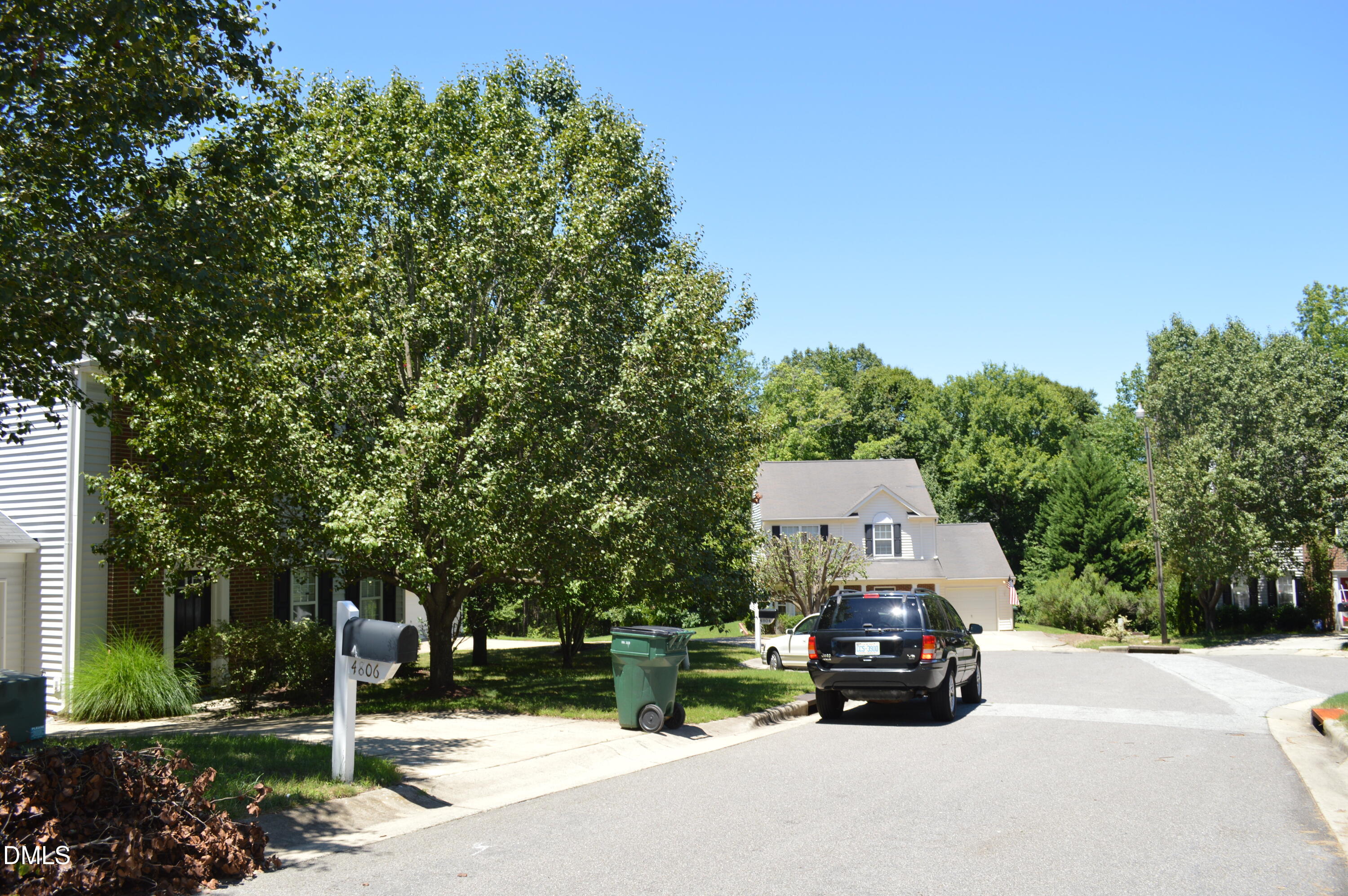 4806 Tapestry Terrace Durham, NC 27713 - Photo 4 of 18 a car parked on the side of a road