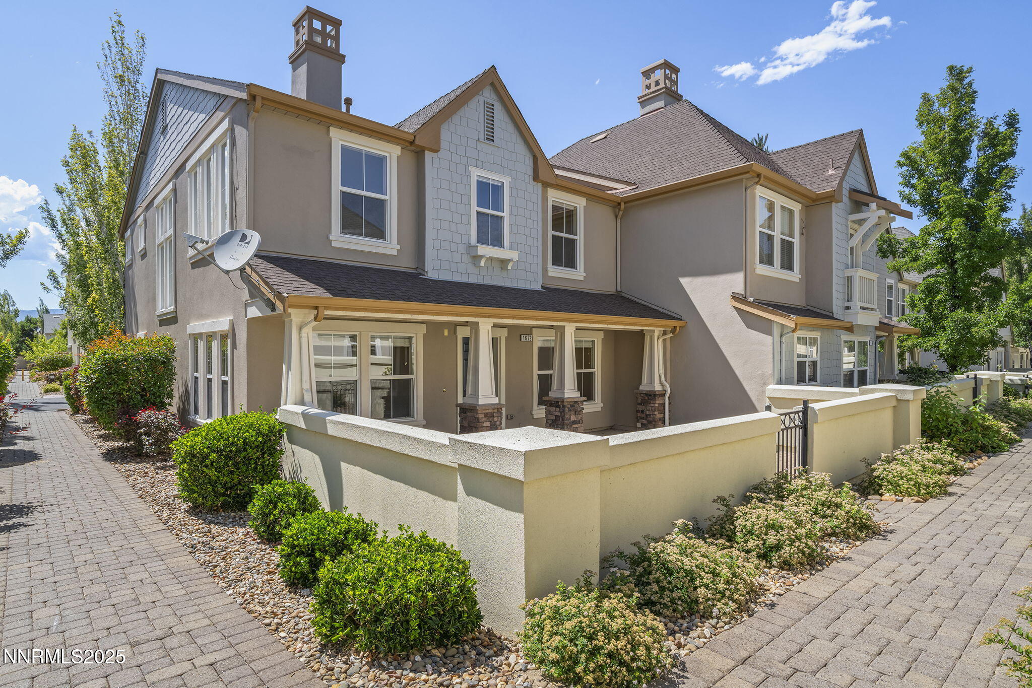 1672 Spring Hill Drive Reno, NV 89523 - Photo 1 of 26 a front view of a house with a yard