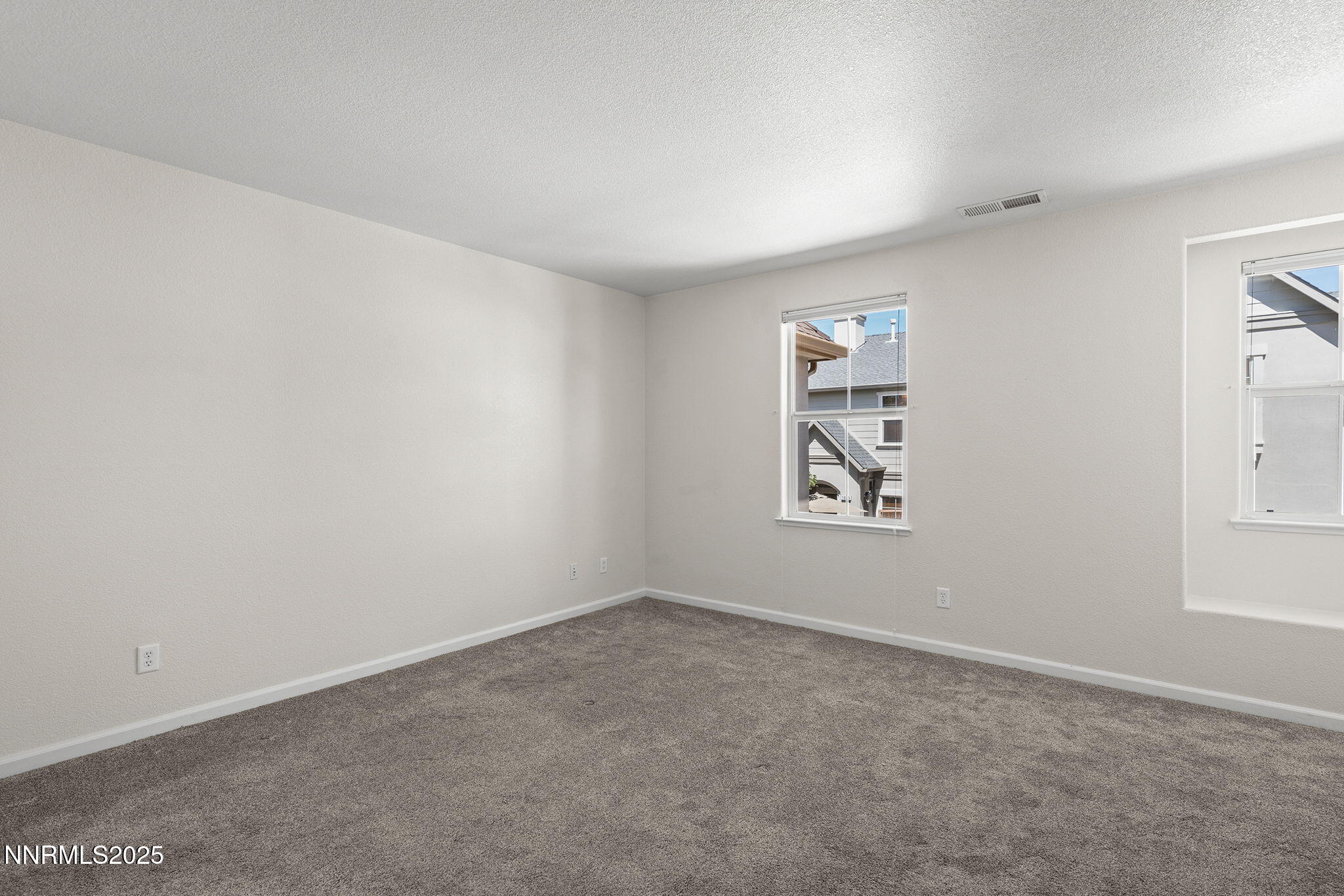 1672 Spring Hill Drive Reno, NV 89523 - Photo 15 of 26 an empty room with windows