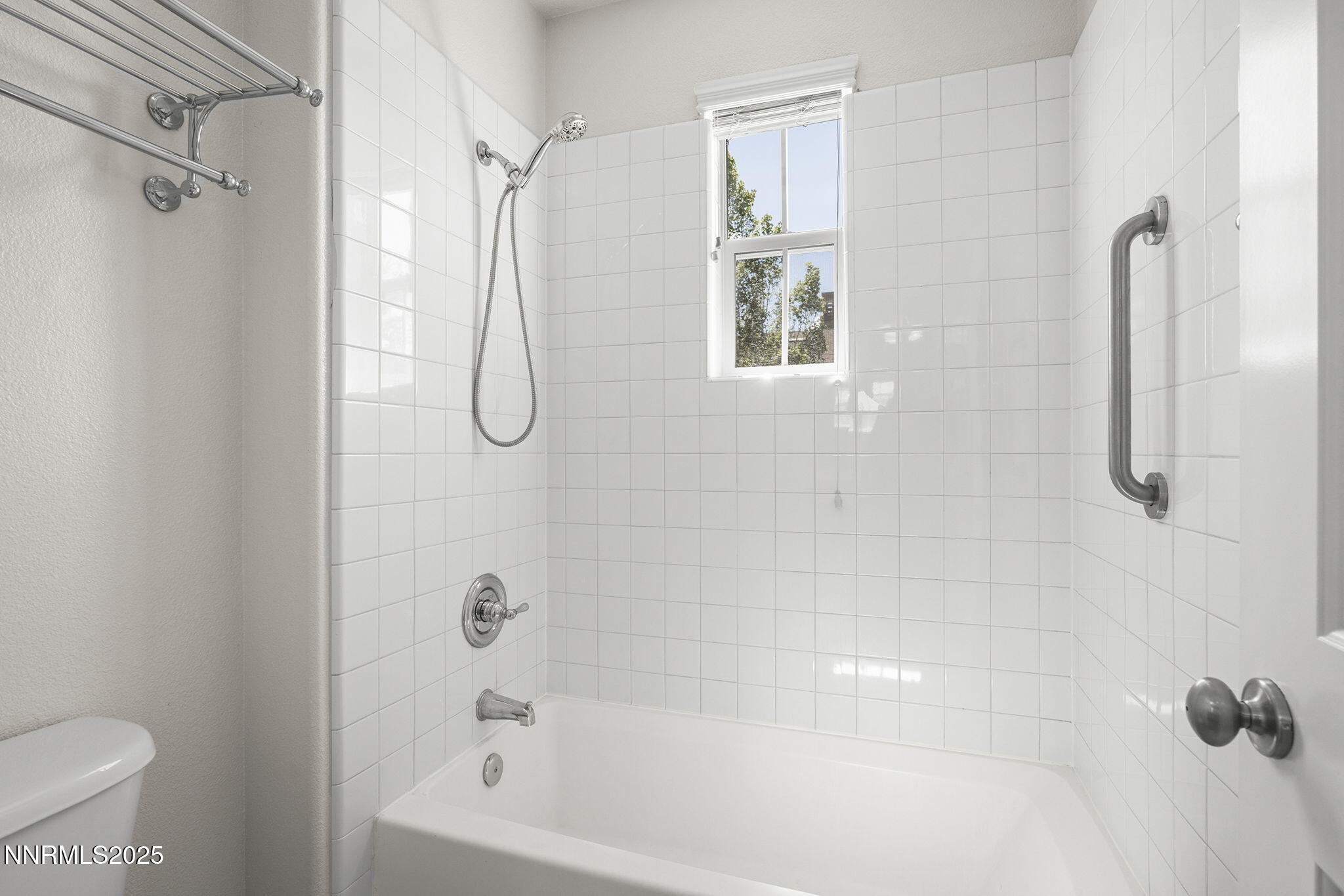 1672 Spring Hill Drive Reno, NV 89523 - Photo 22 of 26 a bathroom with a bath tub with a shower