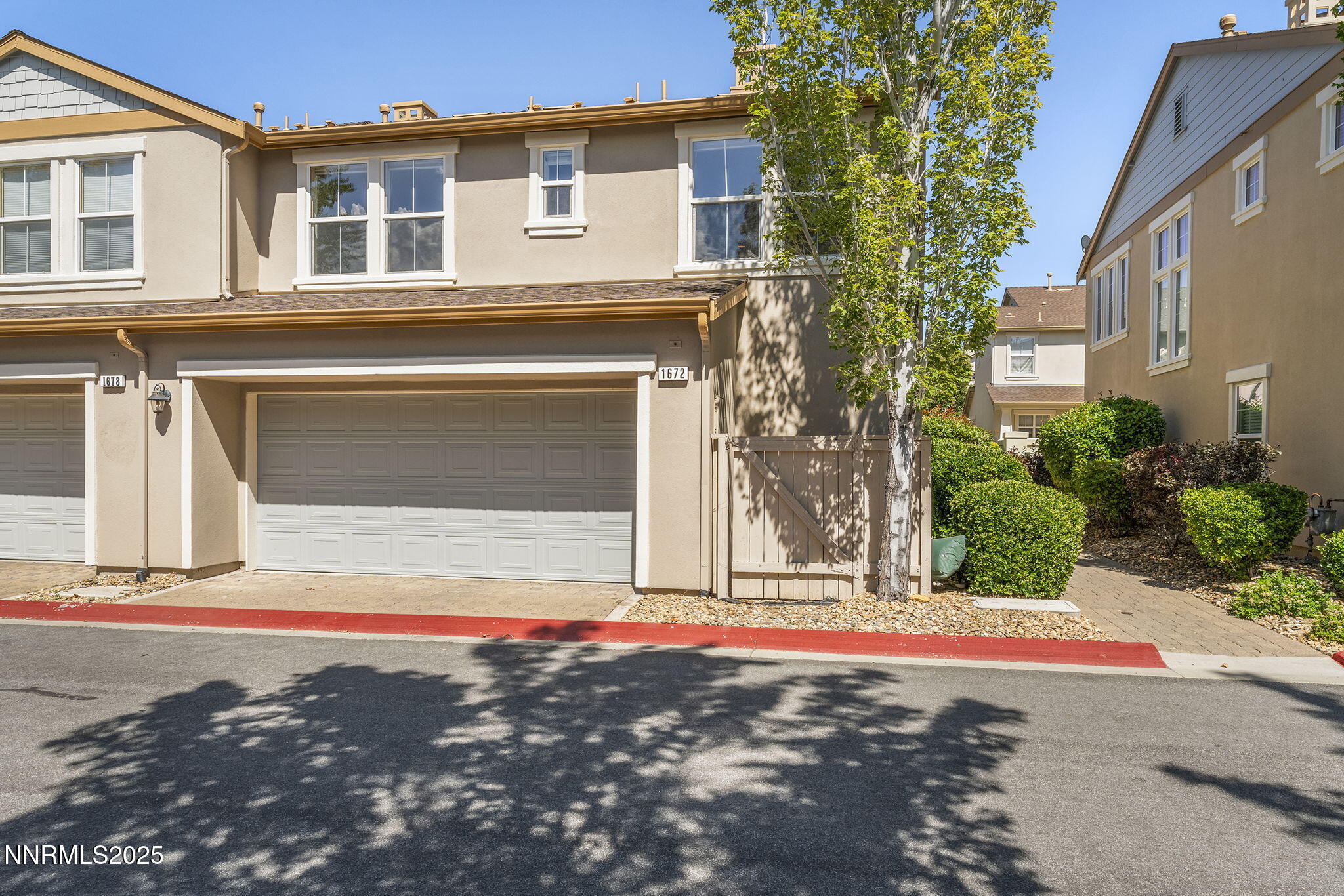 1672 Spring Hill Drive Reno, NV 89523 - Photo 23 of 26 a front view of a house with garage