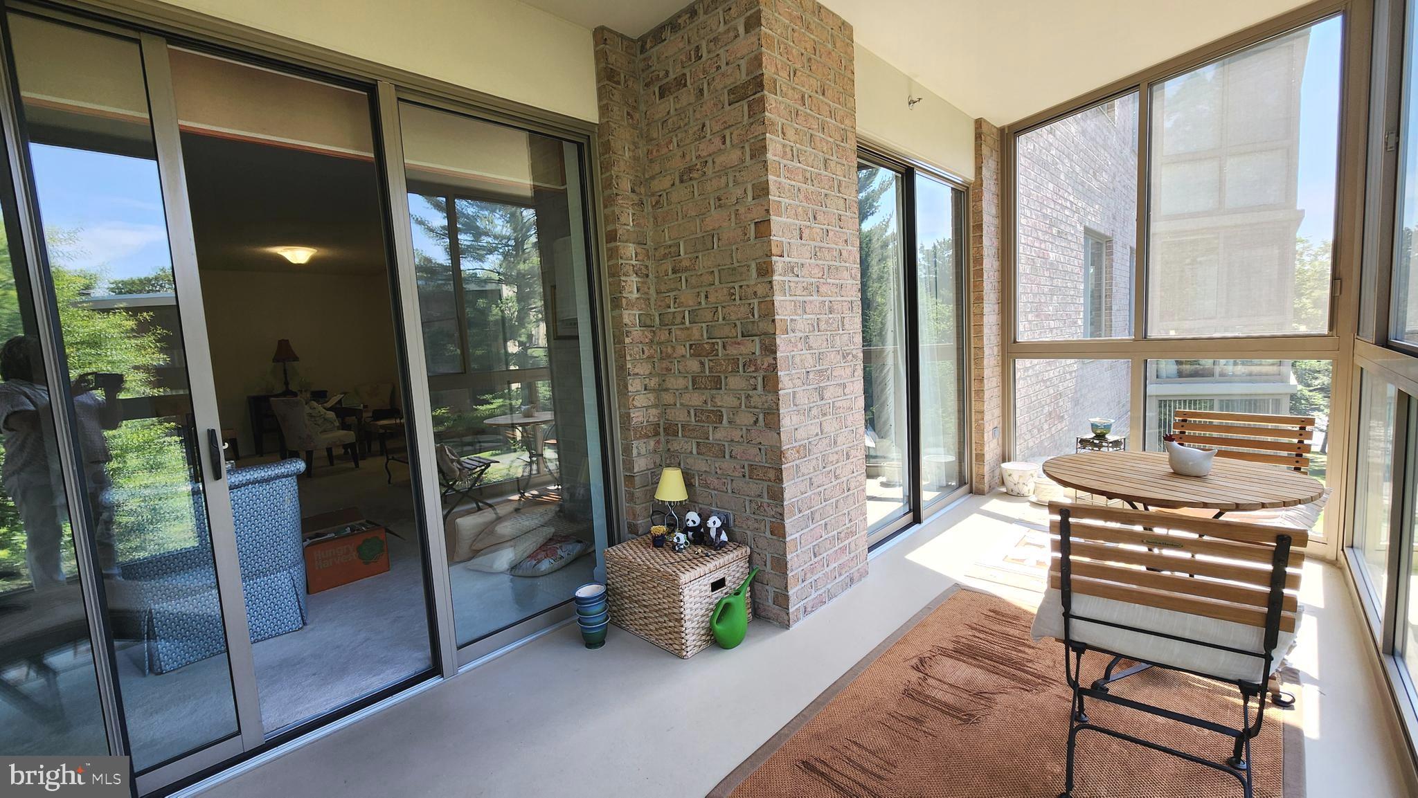 2901 South Leisure World Boulevard, Unit 303 Silver Spring, MD 20906 - Photo 23 of 54 2 exits to glass enclosed balcony