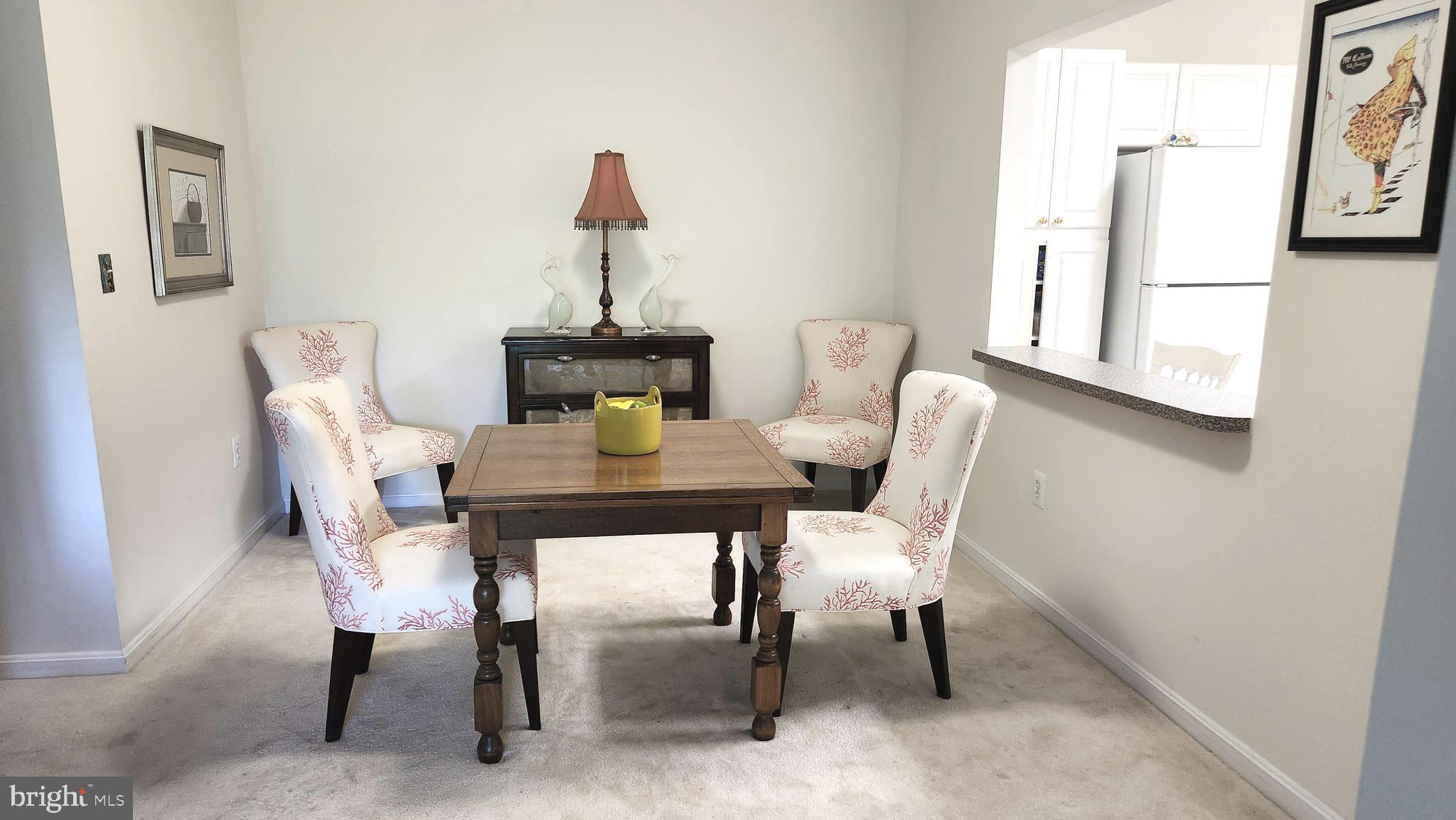 2901 South Leisure World Boulevard, Unit 303 Silver Spring, MD 20906 - Photo 7 of 54 Dining area