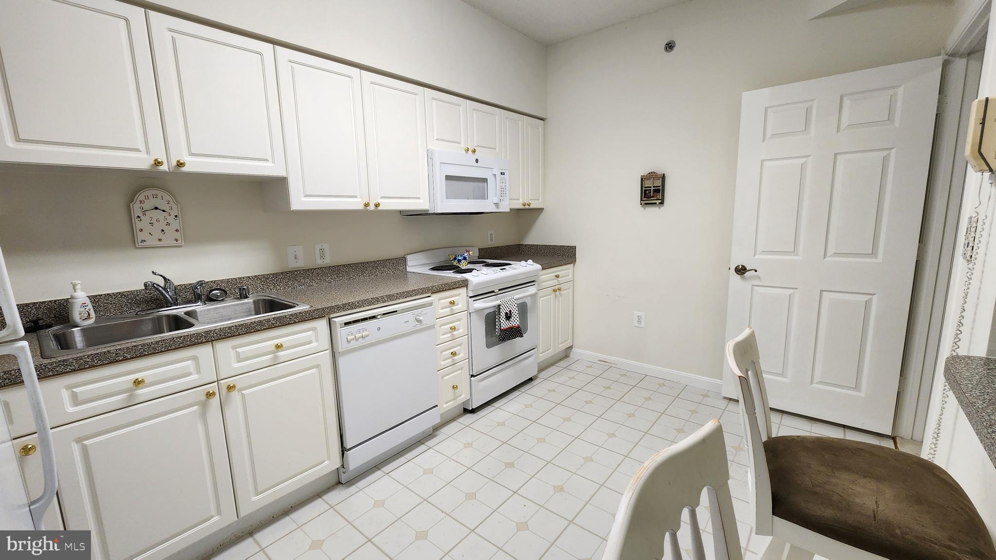2901 South Leisure World Boulevard, Unit 303 Silver Spring, MD 20906 - Photo 10 of 54 Lots of counter space
