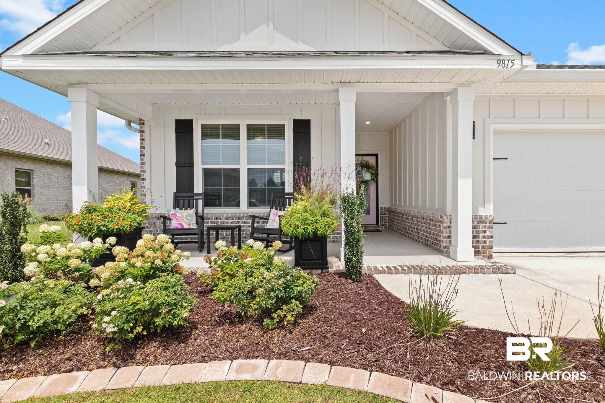 9815 Lakeview Drive Foley, AL 36535 - Photo 12 of 100 View of front of house with covered porch and a garage