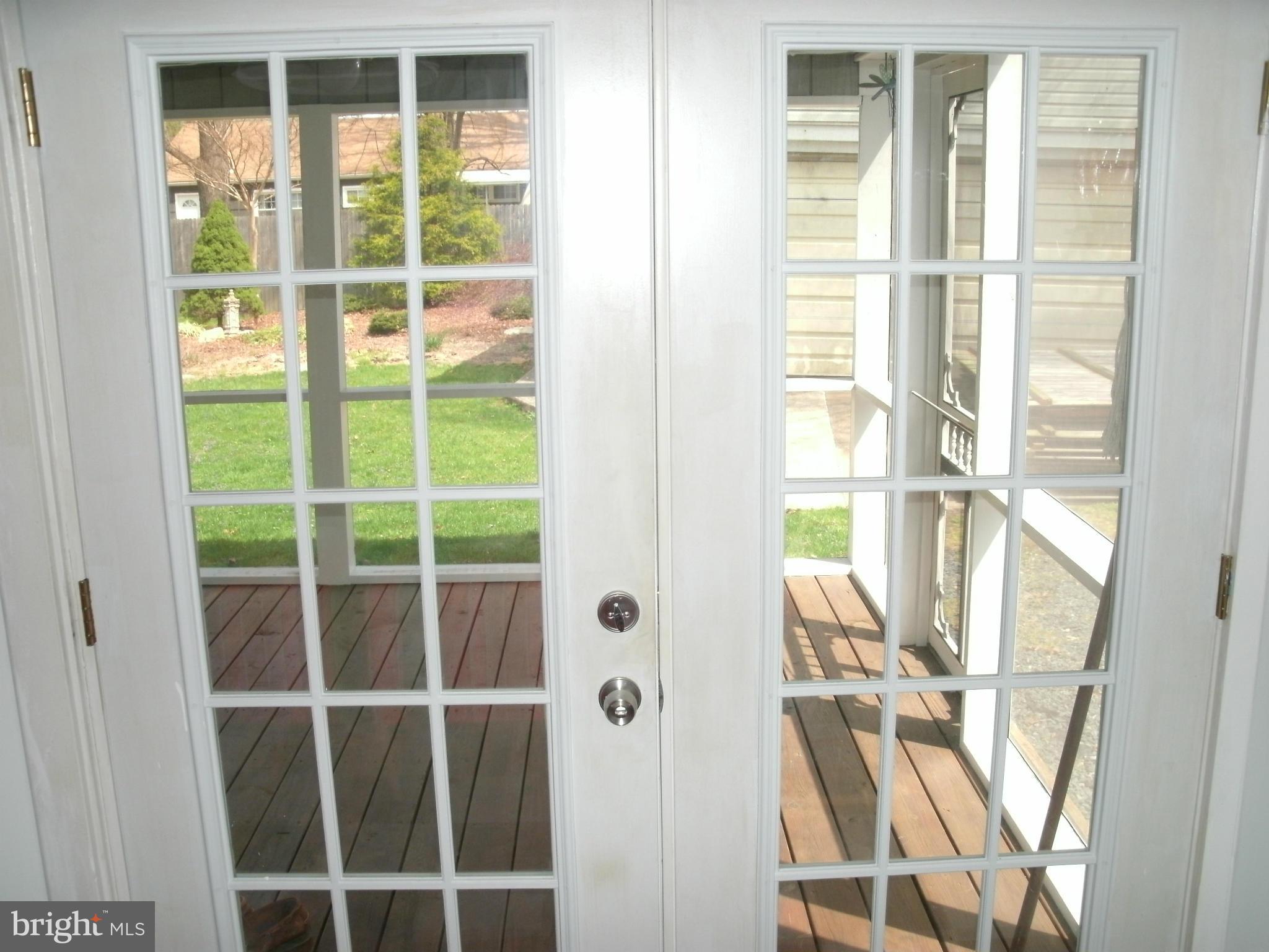 8203 Bon Air Road Baltimore, MD 21234 - Photo 13 of 20 French Atrium Doors to Screened Porch