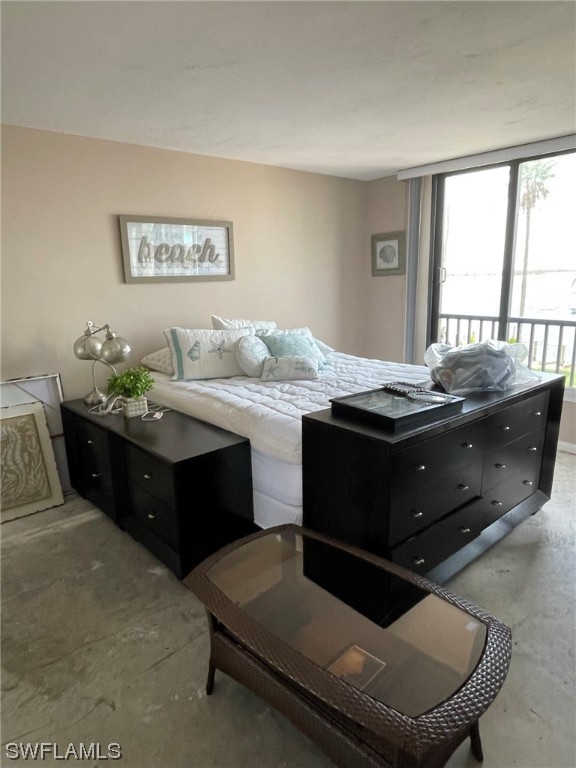 15031 Punta Rassa Road, Unit 206 Fort Myers, FL 33908 - Photo 12 of 23 a room with a chandelier furniture and window