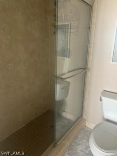 15031 Punta Rassa Road, Unit 206 Fort Myers, FL 33908 - Photo 15 of 23 a bathroom with a toilet and a shower