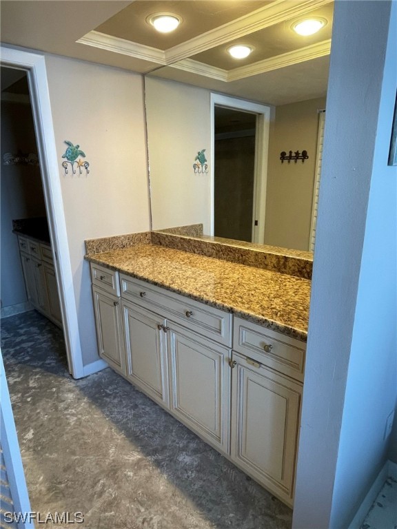 15031 Punta Rassa Road, Unit 206 Fort Myers, FL 33908 - Photo 20 of 23 a bathroom with a granite countertop sink and a mirror