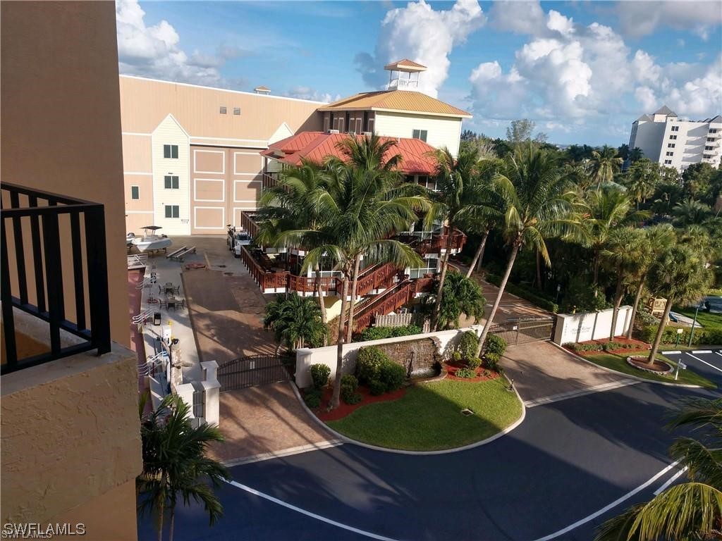 15031 Punta Rassa Road, Unit 206 Fort Myers, FL 33908 - Photo 21 of 23 a view of a balcony with sitting area