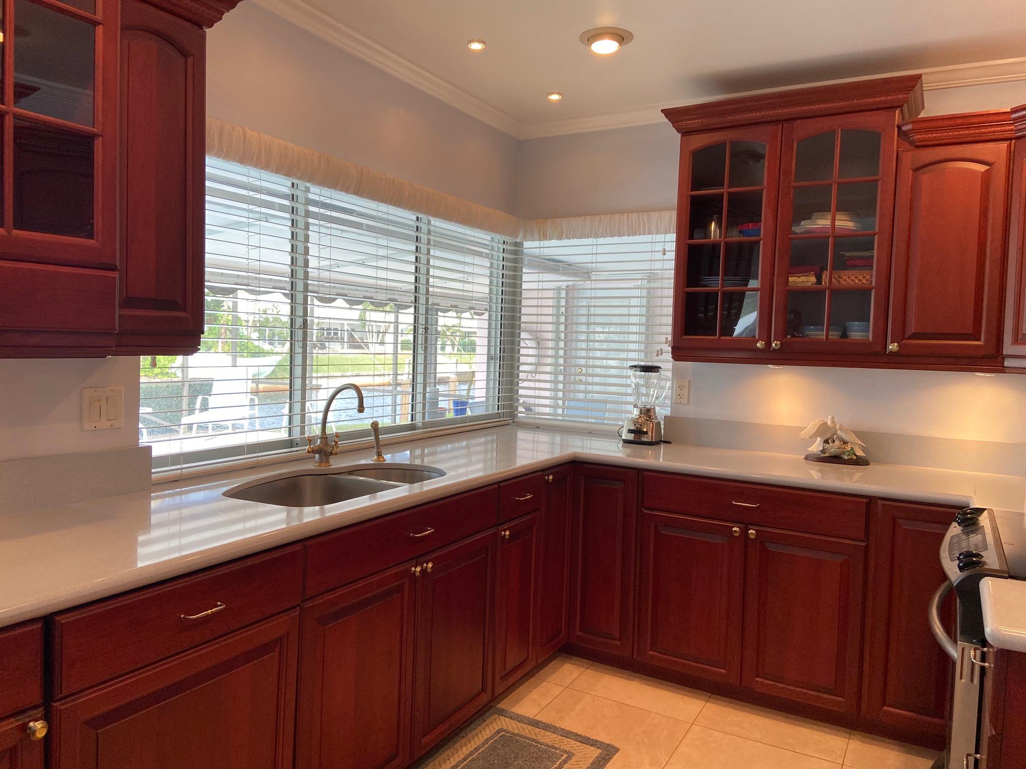753 Bayberry Terrace Boca Raton, FL 33486 - Photo 19 of 33 Kitchen with pass thru window