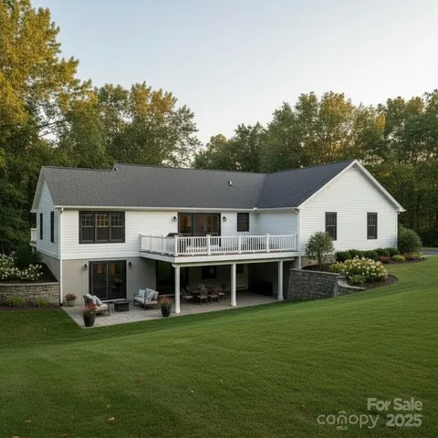 a aerial view of a house with a yard