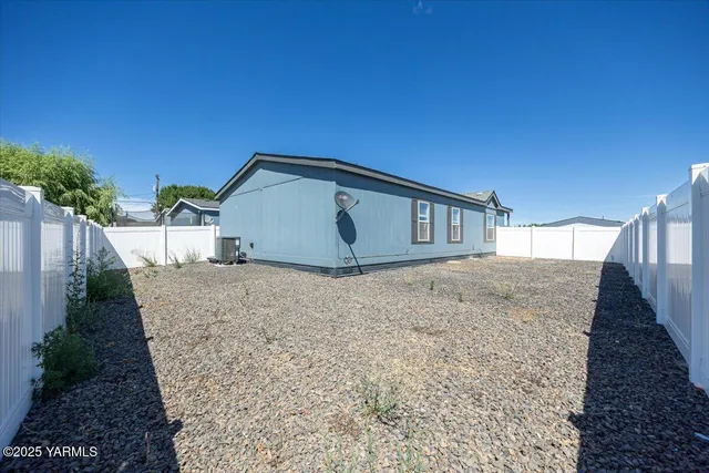 a house view with a backyard space