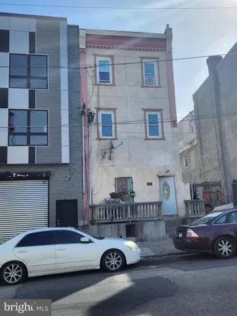 a car parked in front of a building