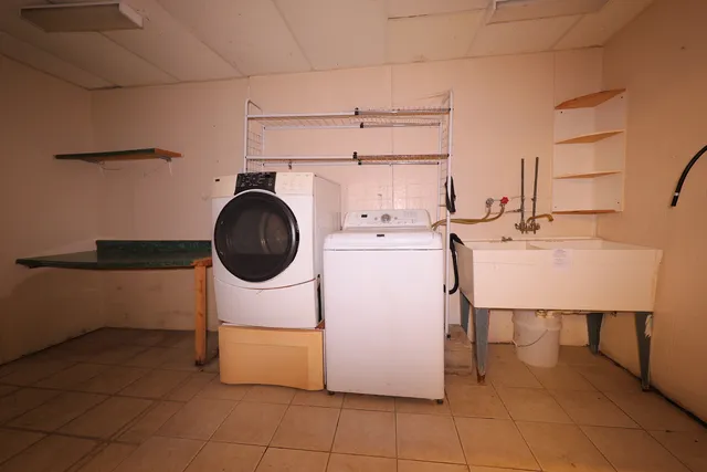 a view of a swimming pool with a patio