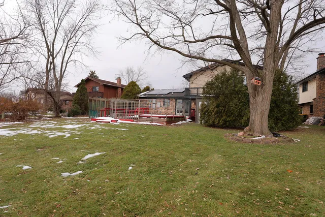 a view of swimming pool with a yard