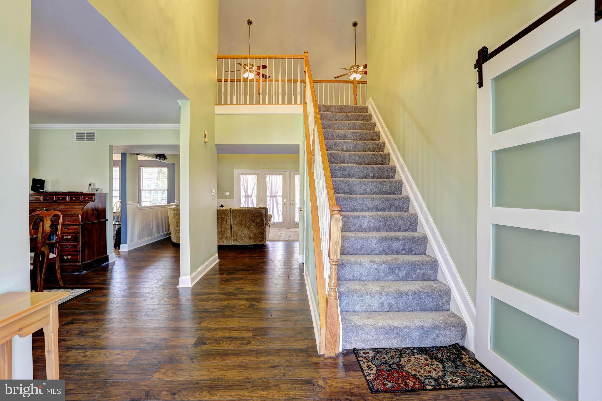 1700 Perry Cove Road Pasadena, MD 21122 - Photo 15 of 30 GRAND FOYER WITH OVERLOOKING BALCONY