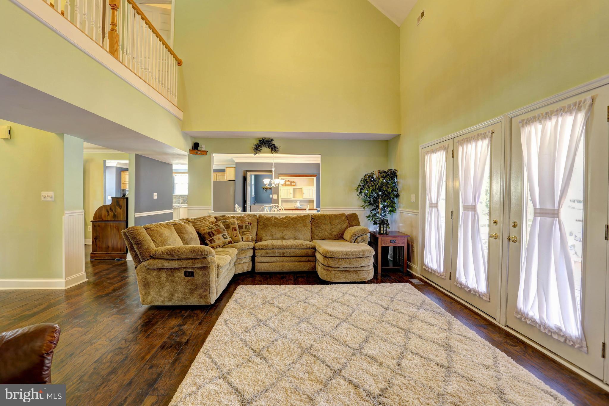 1700 Perry Cove Road Pasadena, MD 21122 - Photo 18 of 30 FAMILY ROOM WITH EXPANISVE VIEWS OF THE YARD